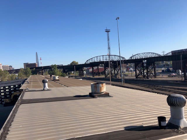 Before — Industrial Warehouse Metal Roof Restoration Coating — Rail Corridor Facility