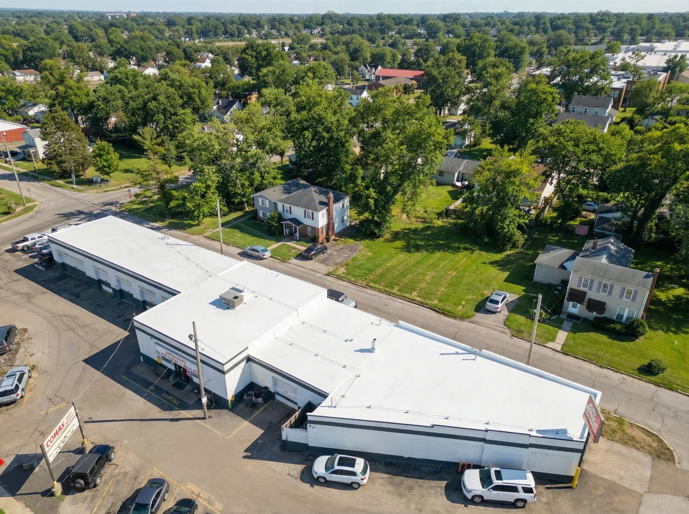 After — Commercial Flat Roof TPO Membrane Replacement — Auto Service Center
